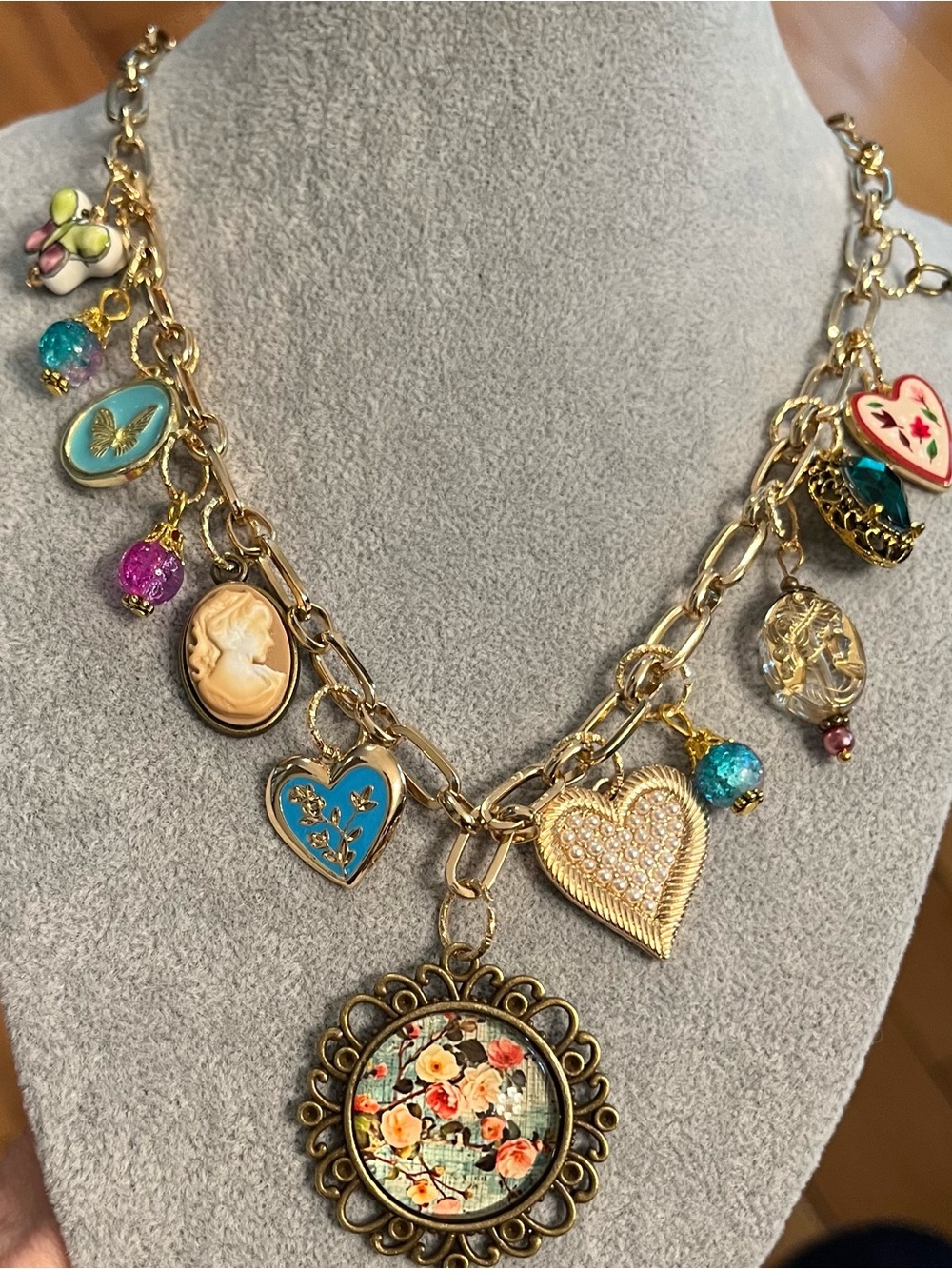 Vintage-Boho Inspired Gold Charm Necklace with Blue and Pink Accents